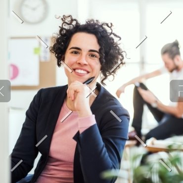 demo-attachment-89-a-portrait-of-young-businesswoman-sitting-in-a-JABCPXQ